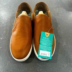 Brand new with tags Olukai slips on with collapsible back. Super comfortable